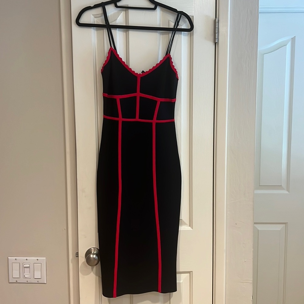 BCBG Size Medium fitted dress never worn with tag still on back​